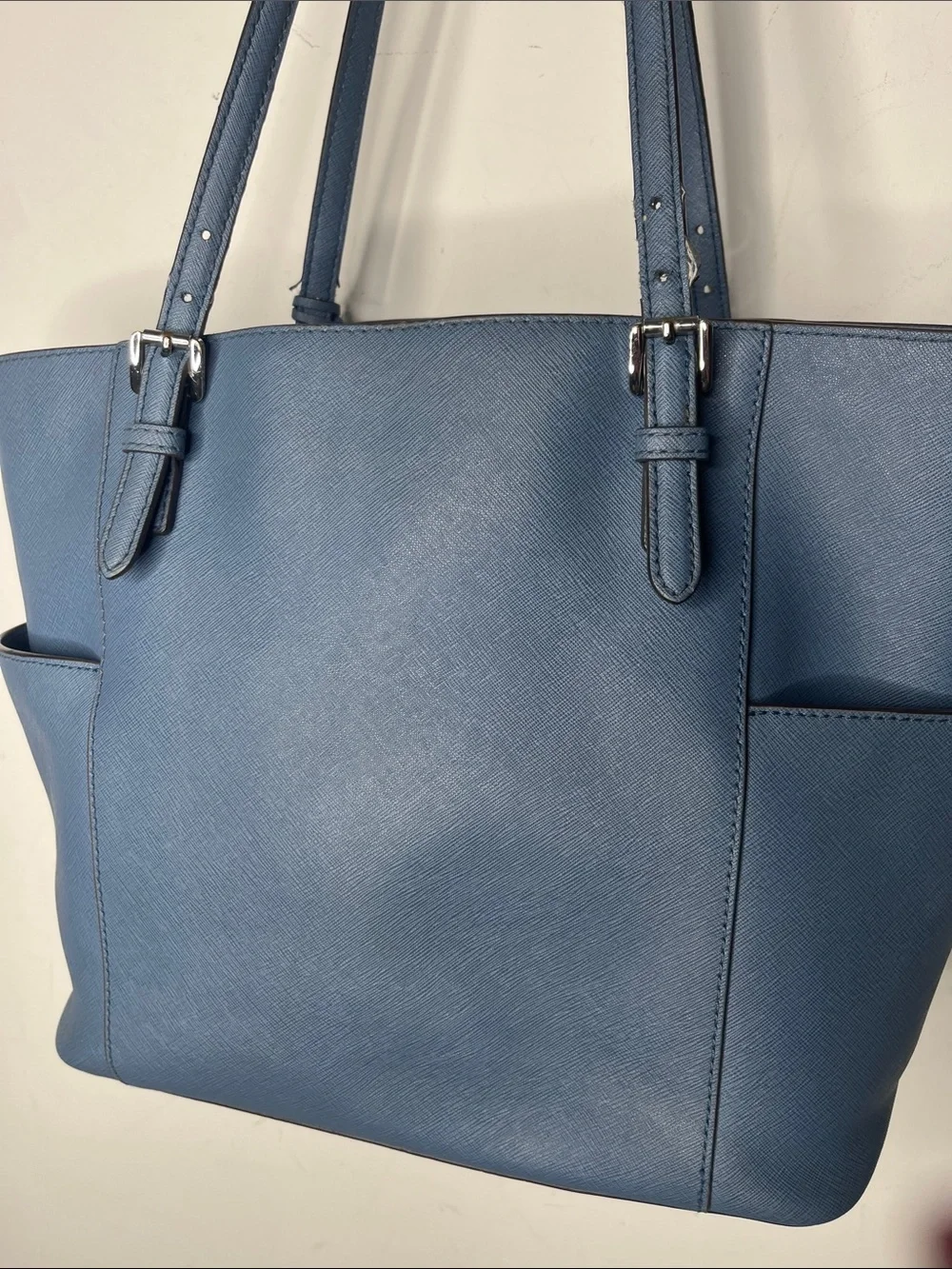 Michael Kors Jet Set Saffiano leather tote bag with silver-tone hardware.